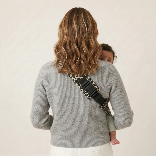 Baby Sling Carrier | Wild Leopard — secure, ergonomic, and designed for on the go.